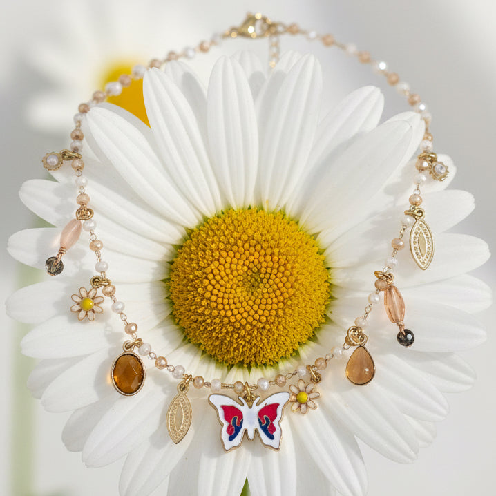 GLOW BUTTERFLY – Collana con Perline e Pendente Farfalla in Acciaio Colorato – Eldra Milano