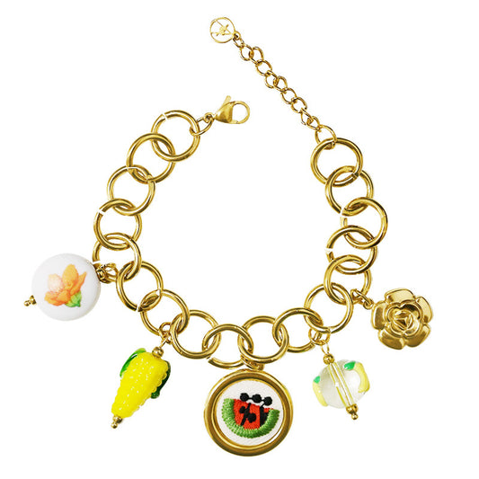FLOWER CHIC – Bracciale Chunky Gold con Charms Frutta e Fiori – Eldra Milano