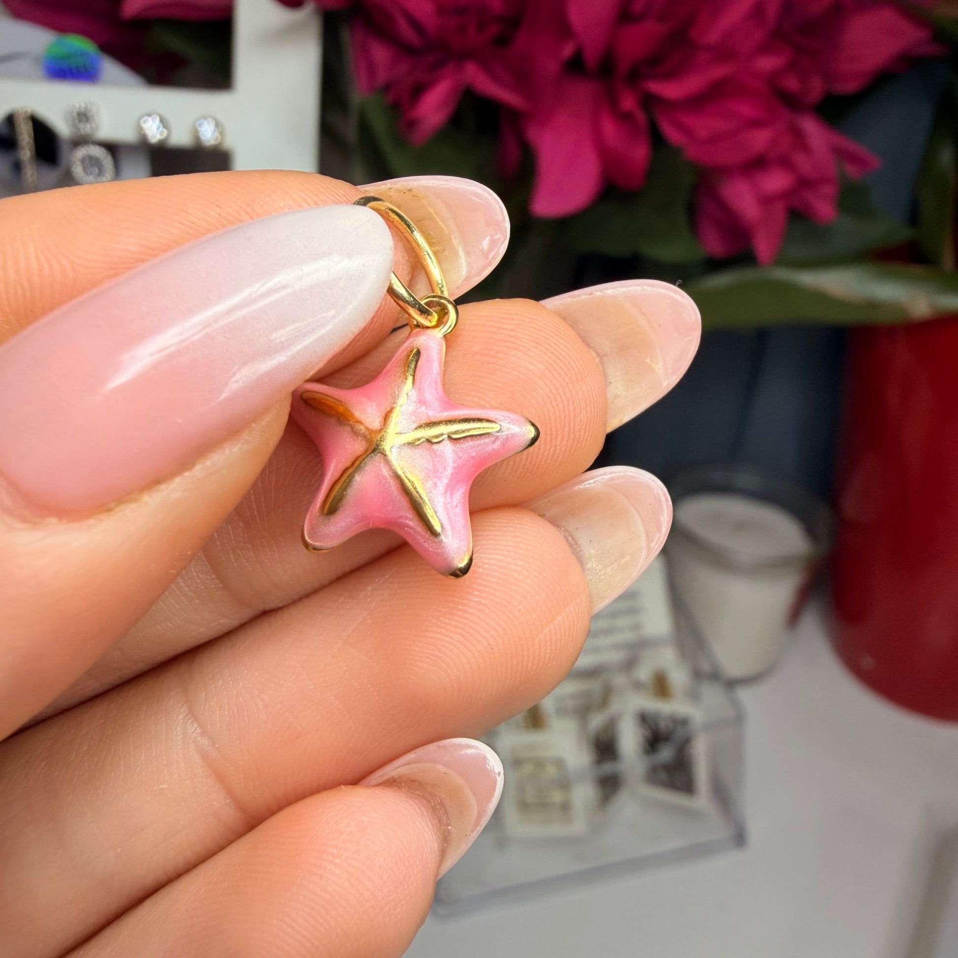 Charm stella marina rosa