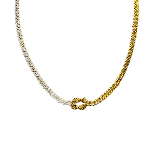 GLOW KNOT – Collana Asimmetrica in Acciaio con Doppia Veretta di Zirconi e Nodo Centrale – Eldra Milano