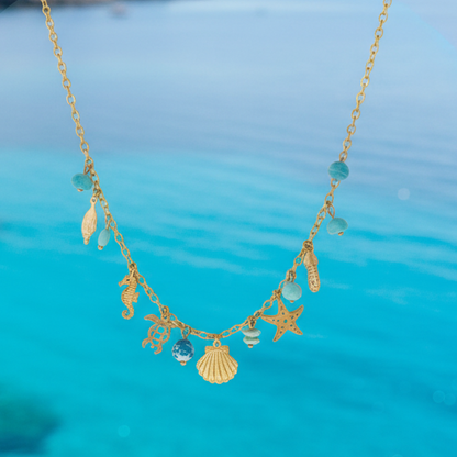 OCEAN TREASURE – Collana in Acciaio con Charms Marini, Perle e Pietre Colorate – Eldra Milano