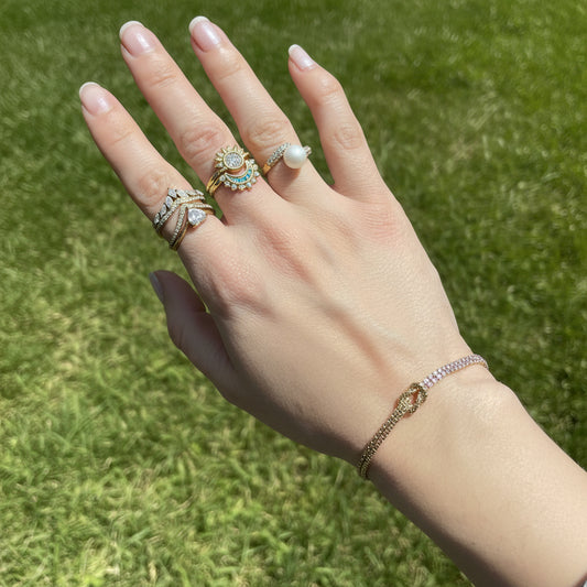 GLOW KNOT BRACELET – Bracciale Asimmetrico in Acciaio con Doppia Veretta di Zirconi e Nodo – Eldra Milano