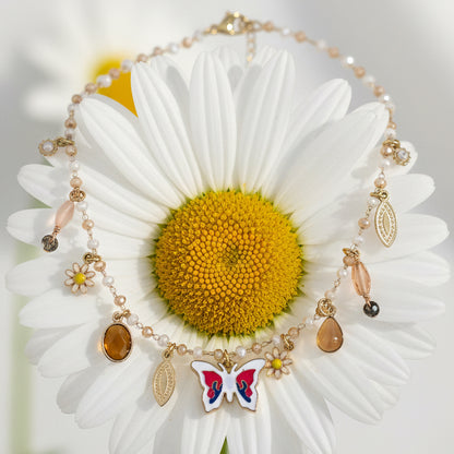 GLOW BUTTERFLY – Collana con Perline e Pendente Farfalla in Acciaio Colorato – Eldra Milano