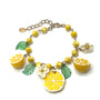 Bracciale CAPRI LEMONS | Catena in Acciaio Inox con Limoni e Fiori in Resina – Eldra Milano