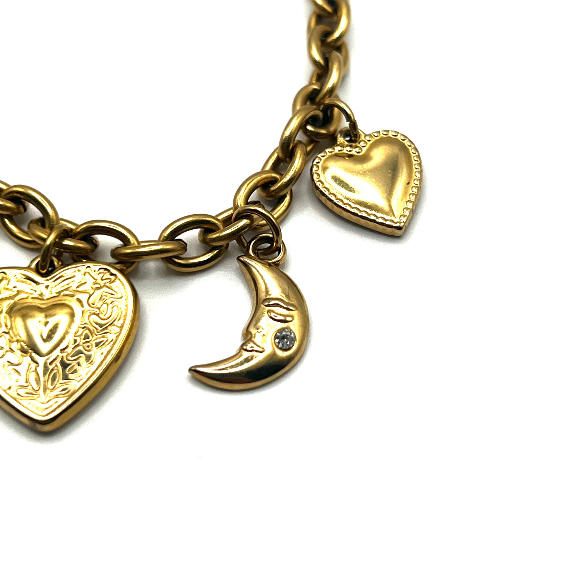 COSMIC CHARM – Bracciale con Ciondoli Sole, Luna, Cuore e Fiore in Acciaio Inossidabile – Eldra Milano