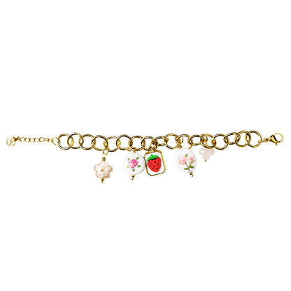 FLOWER CHIC – Bracciale Chunky Gold con Charms Frutta e Fiori – Eldra Milano