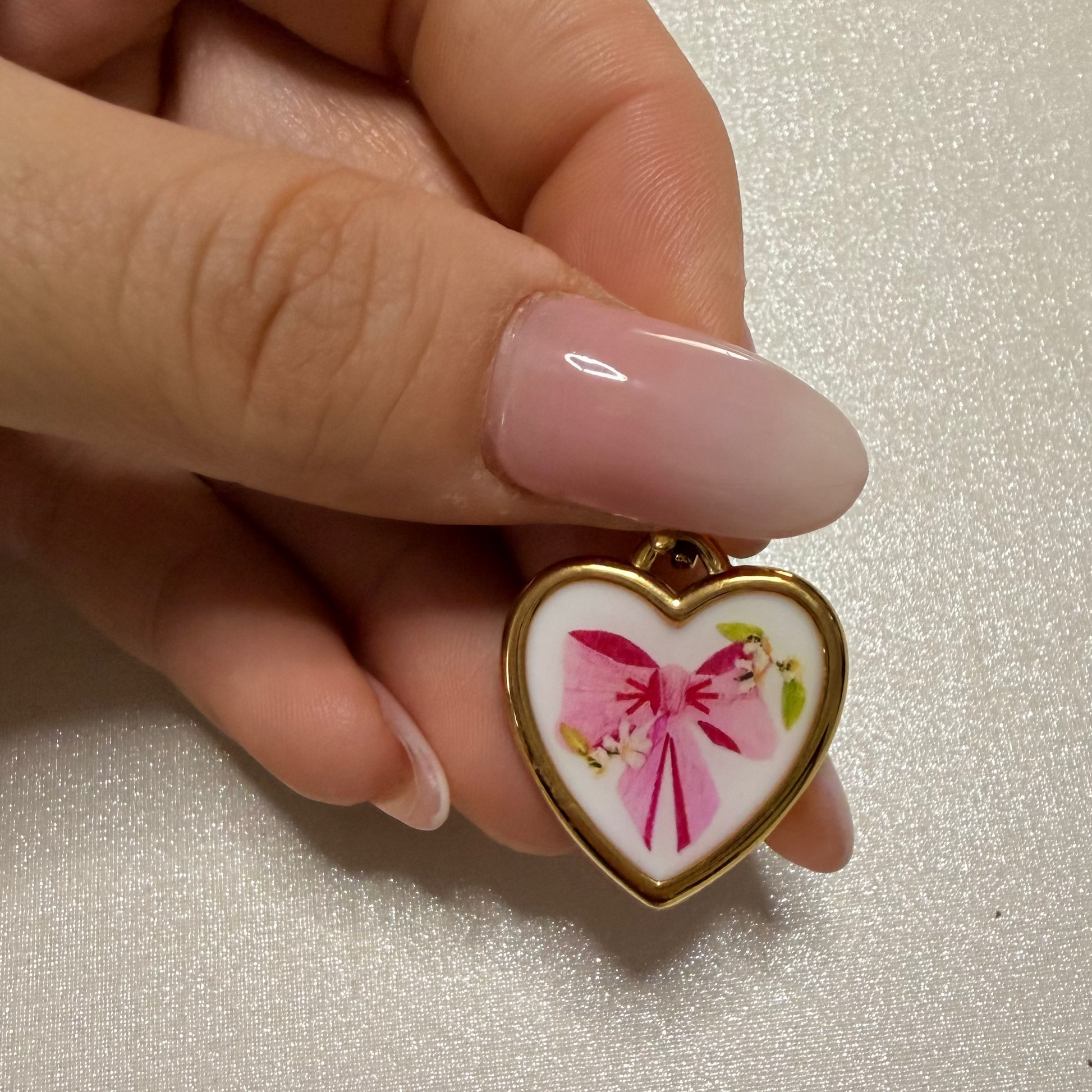 Charm fiocco rosa